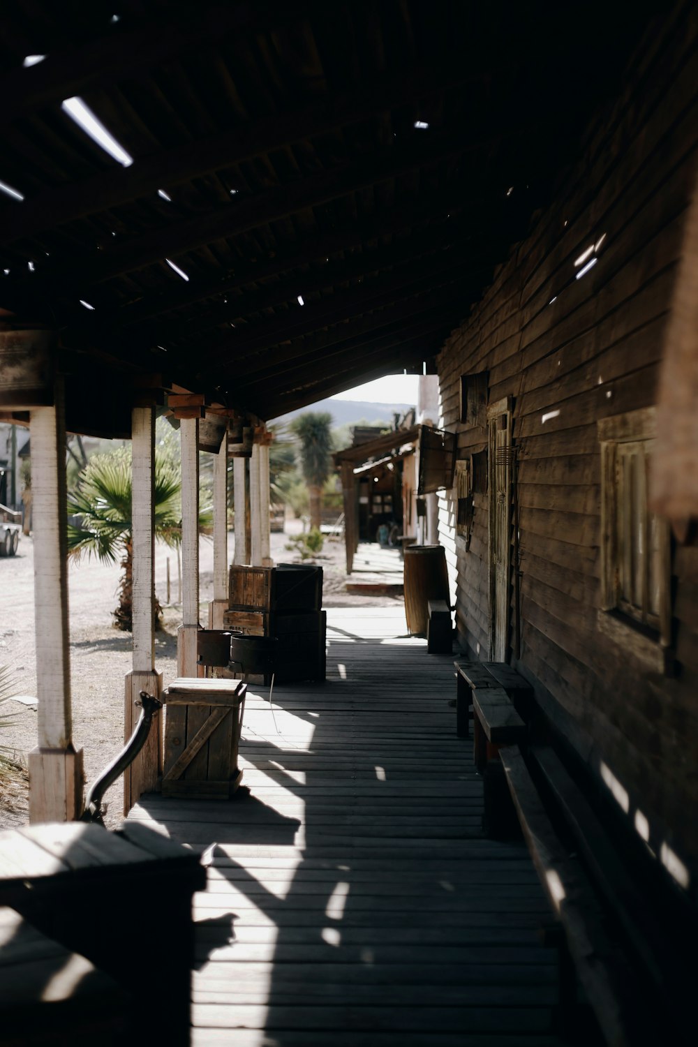 brown wooden bench on brown wooden floor