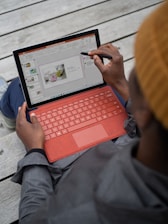 person using Surface tablet