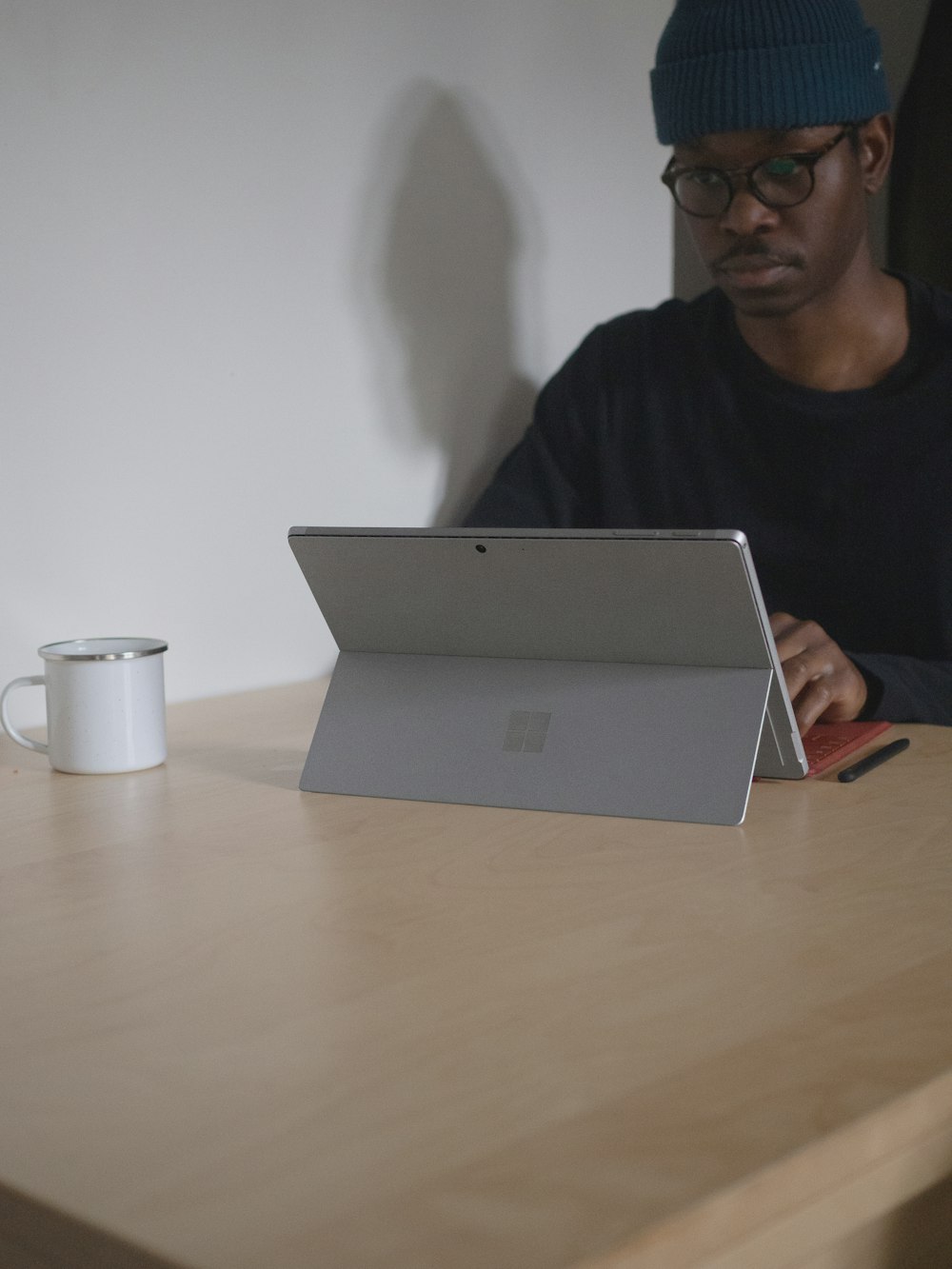man using Surface device