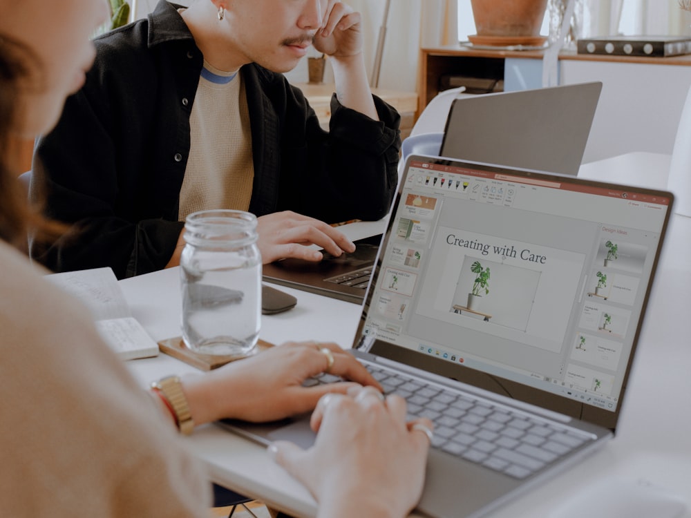 woman using Surface laptop