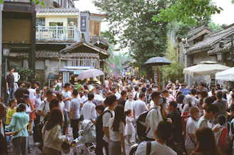 A vibrant street scene showing diverse people using their phones to connect with local services nearby.