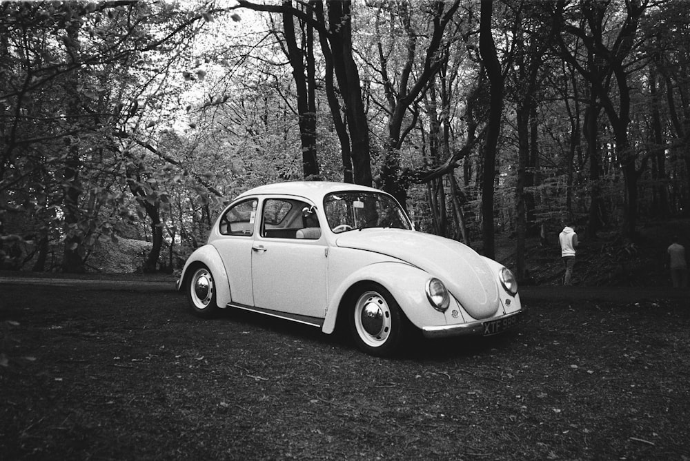 grayscale photo of vintage car