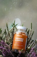 orange and white plastic bottle