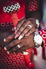 person wearing gold and silver ring