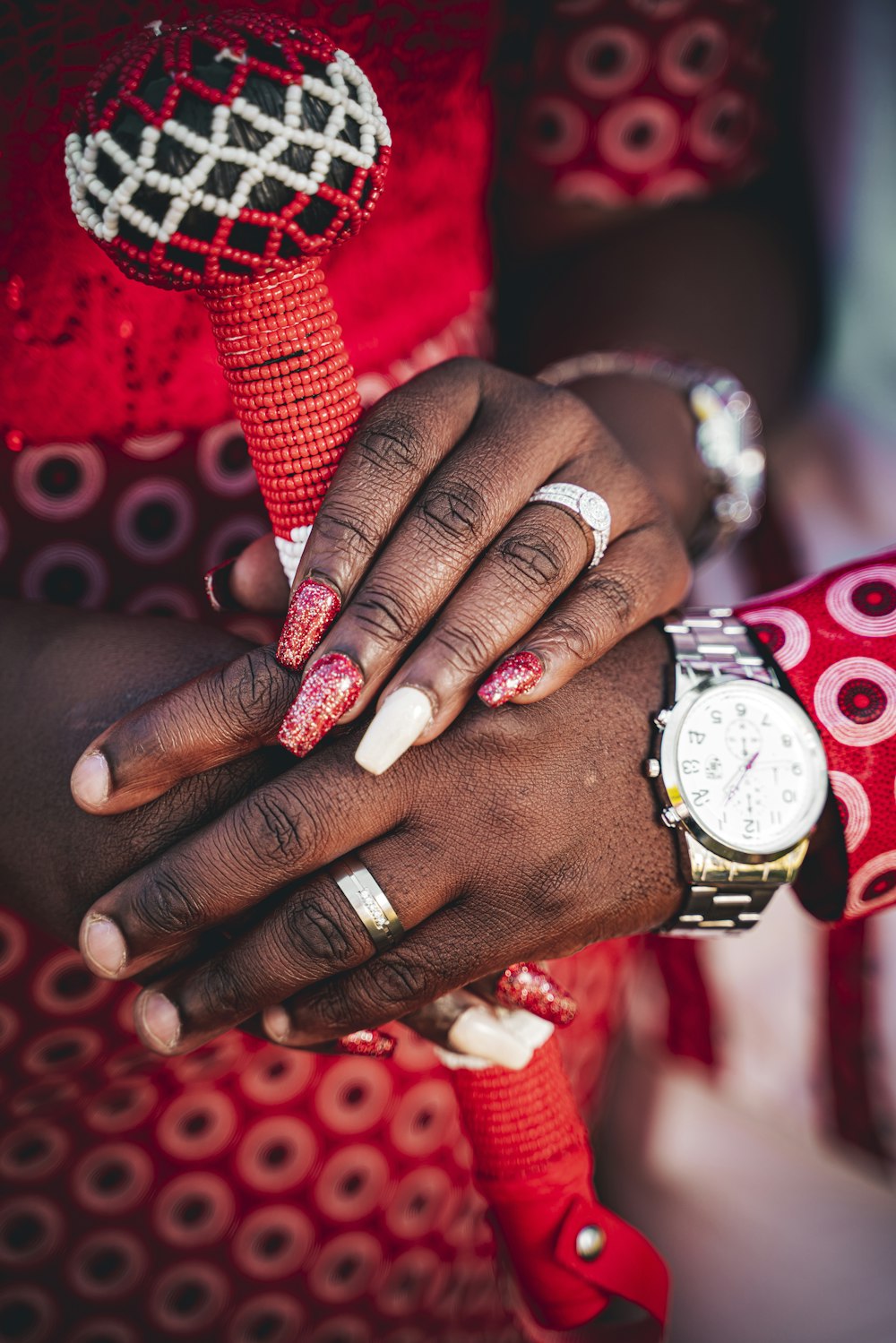 person wearing gold and silver ring