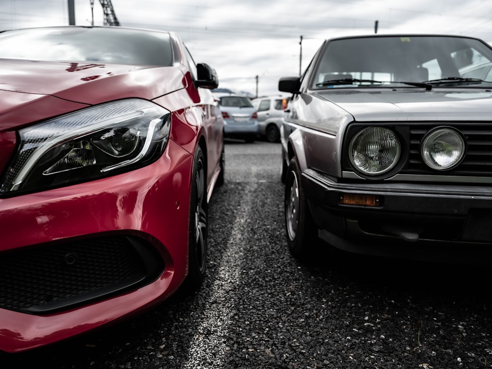 red bmw m 3 parked on parking lot during daytime