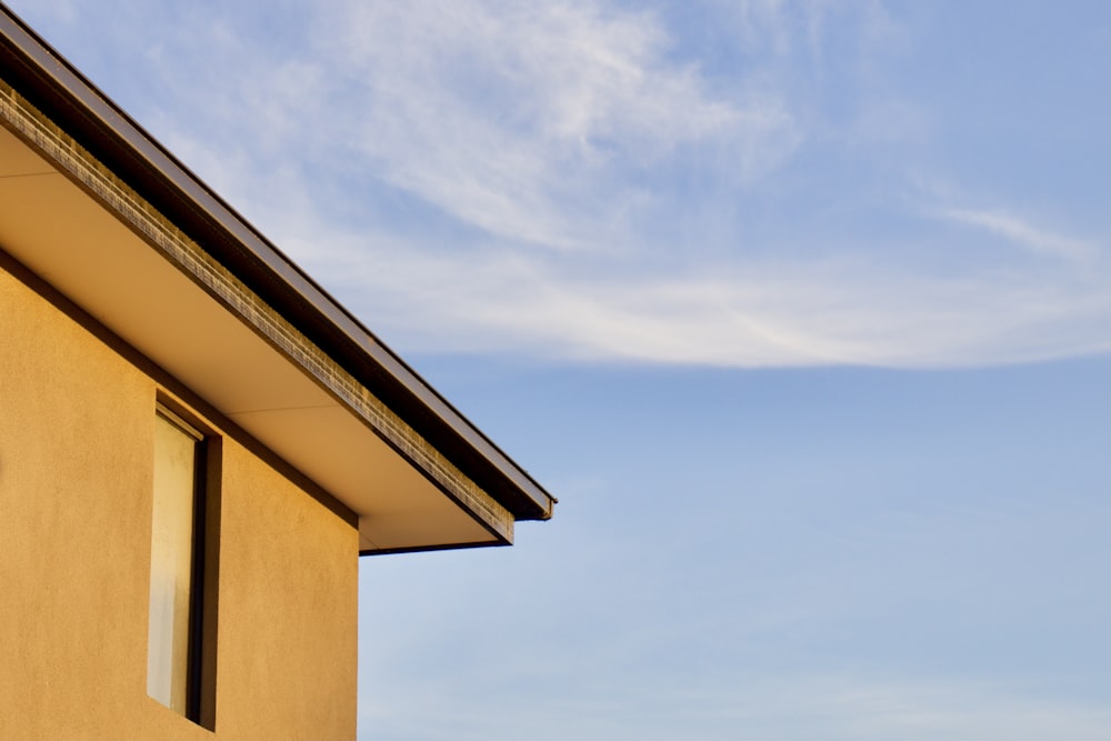 brown concrete building under blue sky during daytime