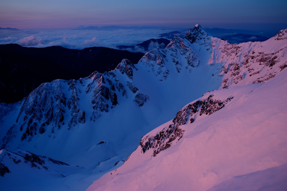 snow covered mountains during daytime