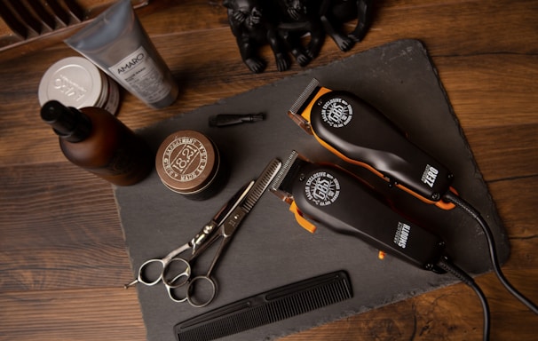 black and silver pocket knife beside silver round coins