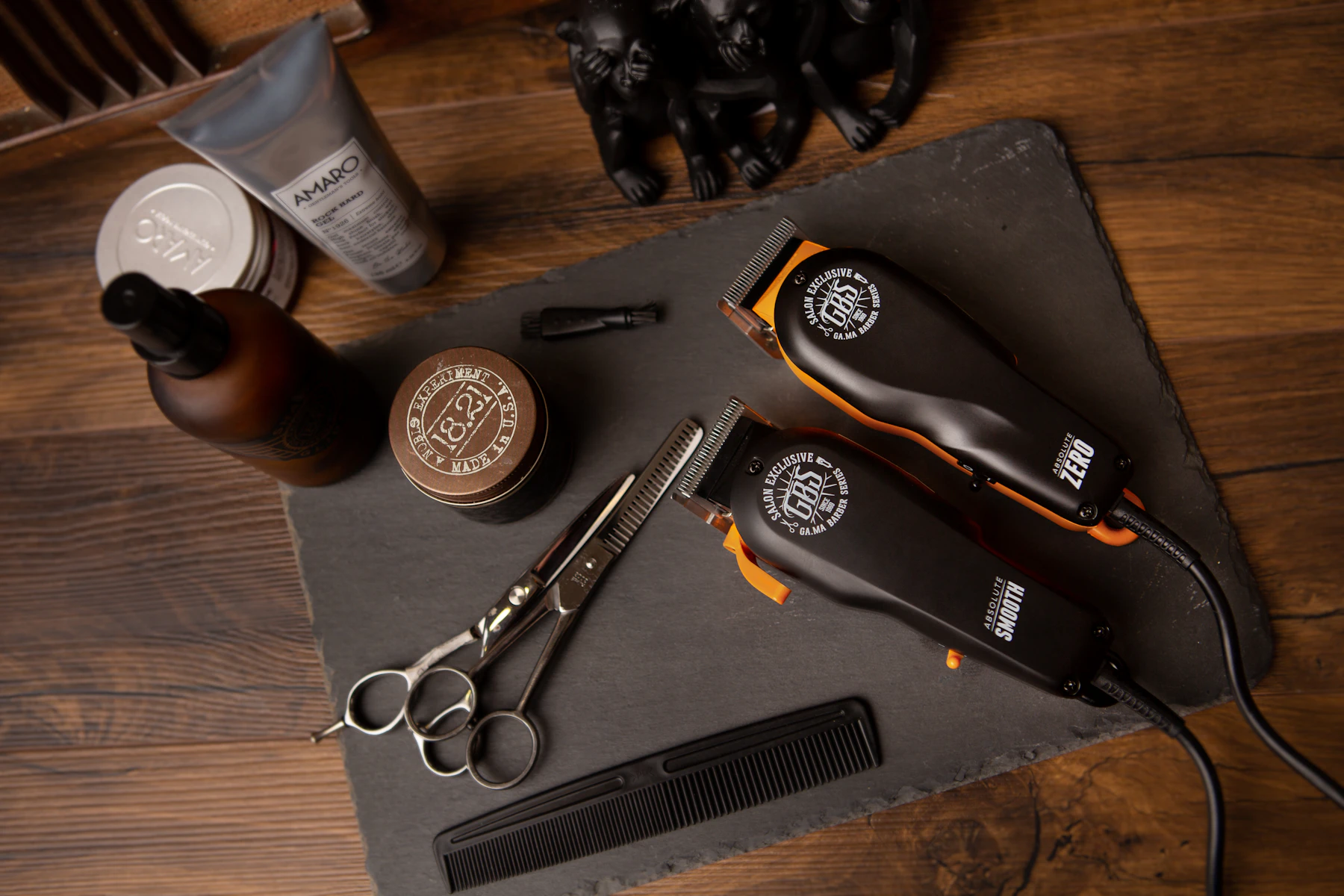 Luxury barber finishing a haircut in a dark studio