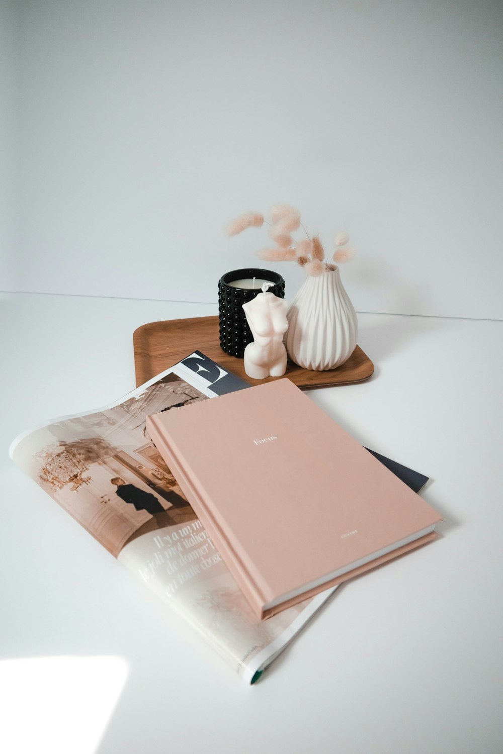 pink book on white table