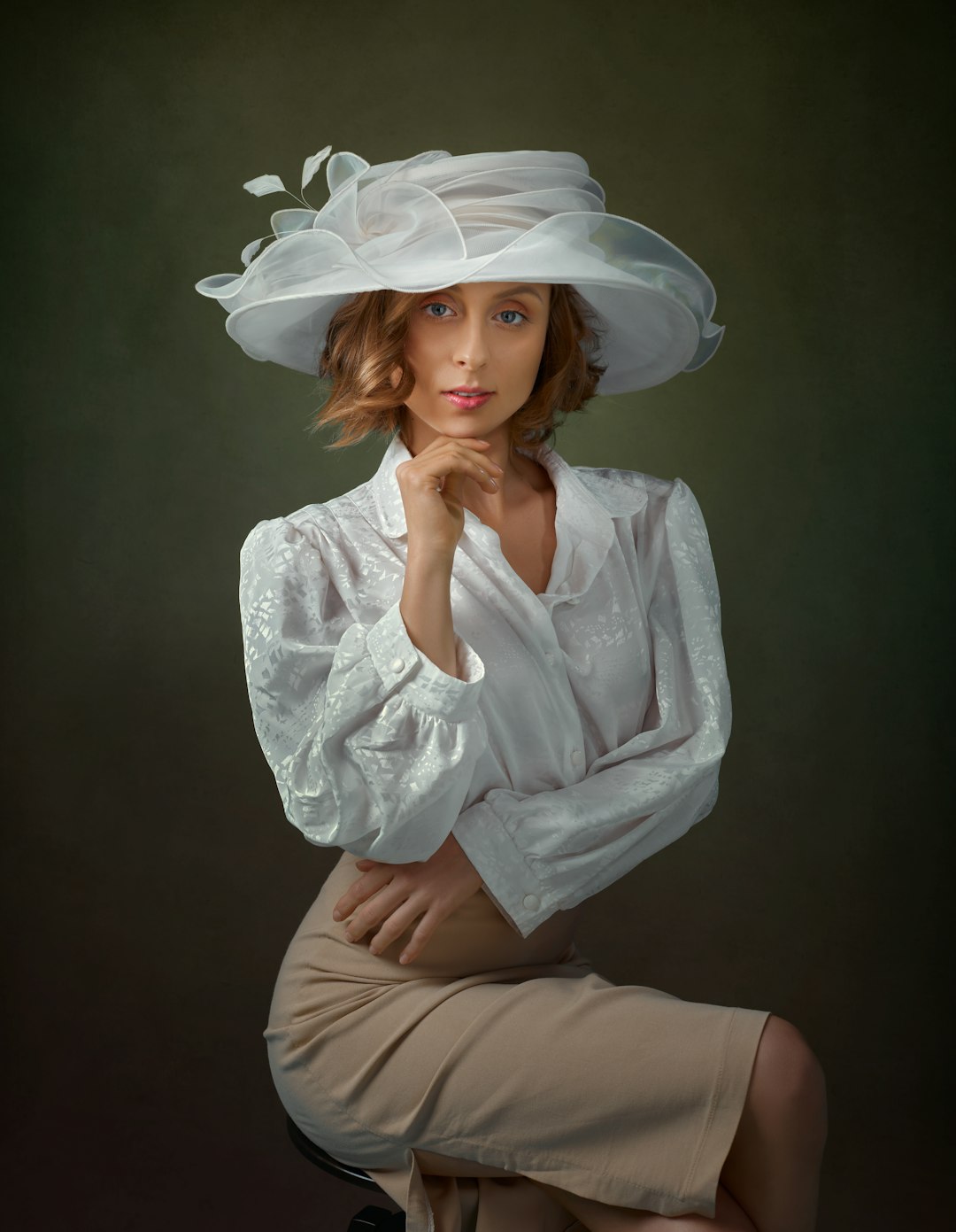 woman in white long sleeve shirt and brown skirt
