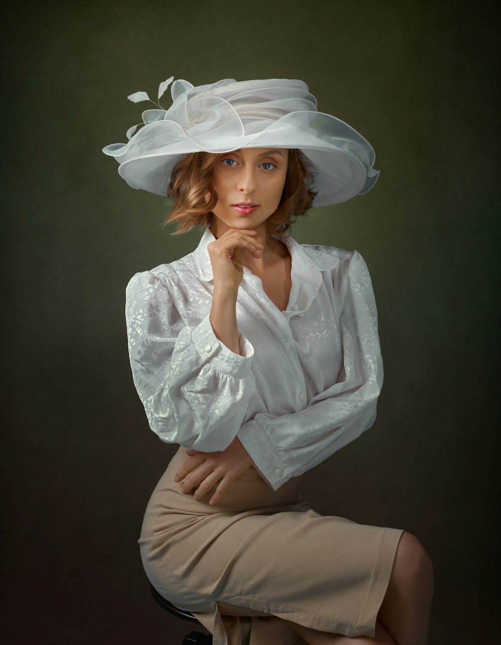 woman in white long sleeve shirt and brown skirt