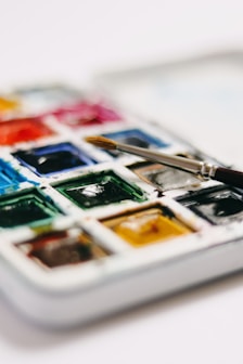 green white and red cards on white tray