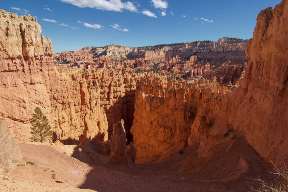 brown rock formation under blue sky during daytime