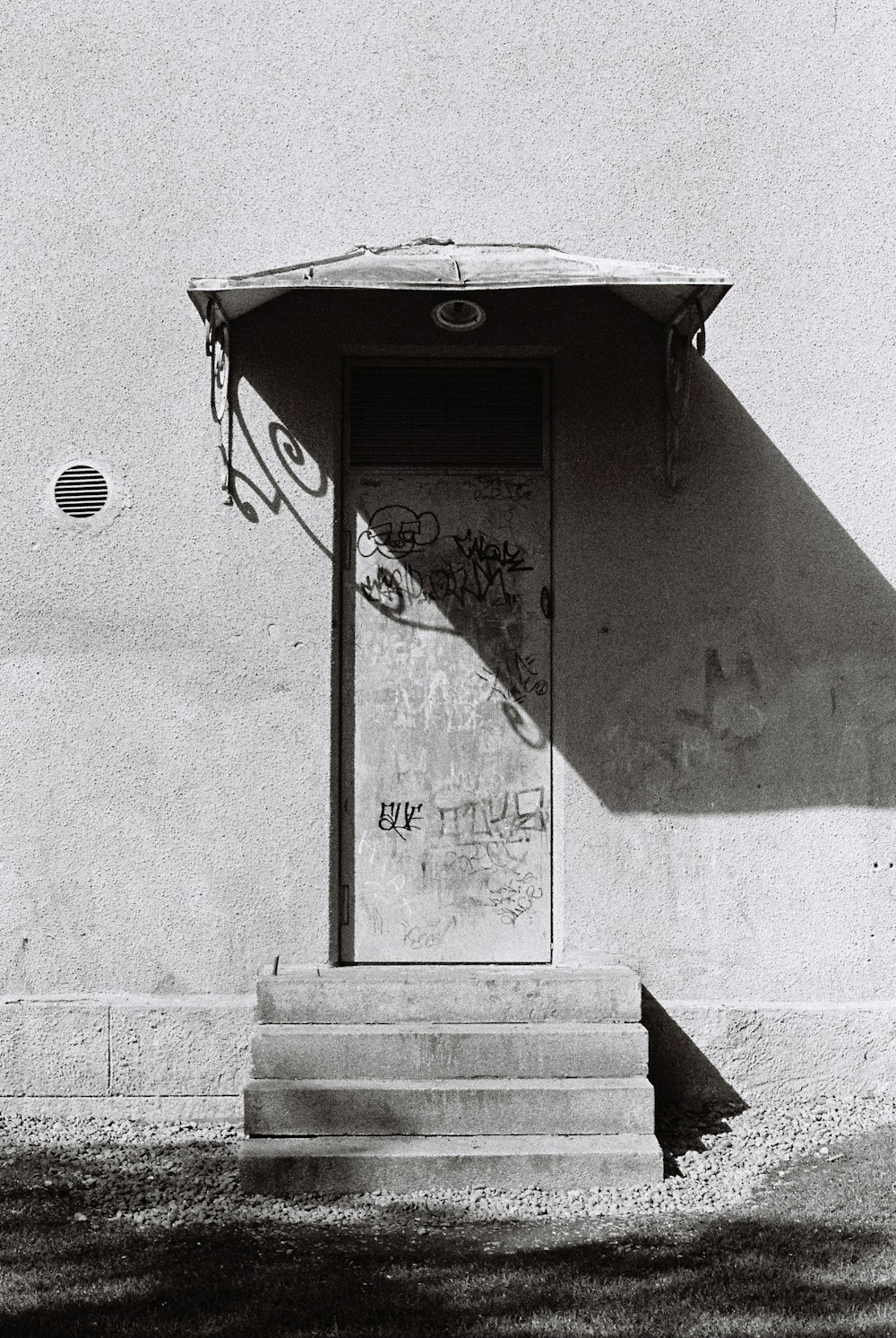 black basketball hoop on white wall