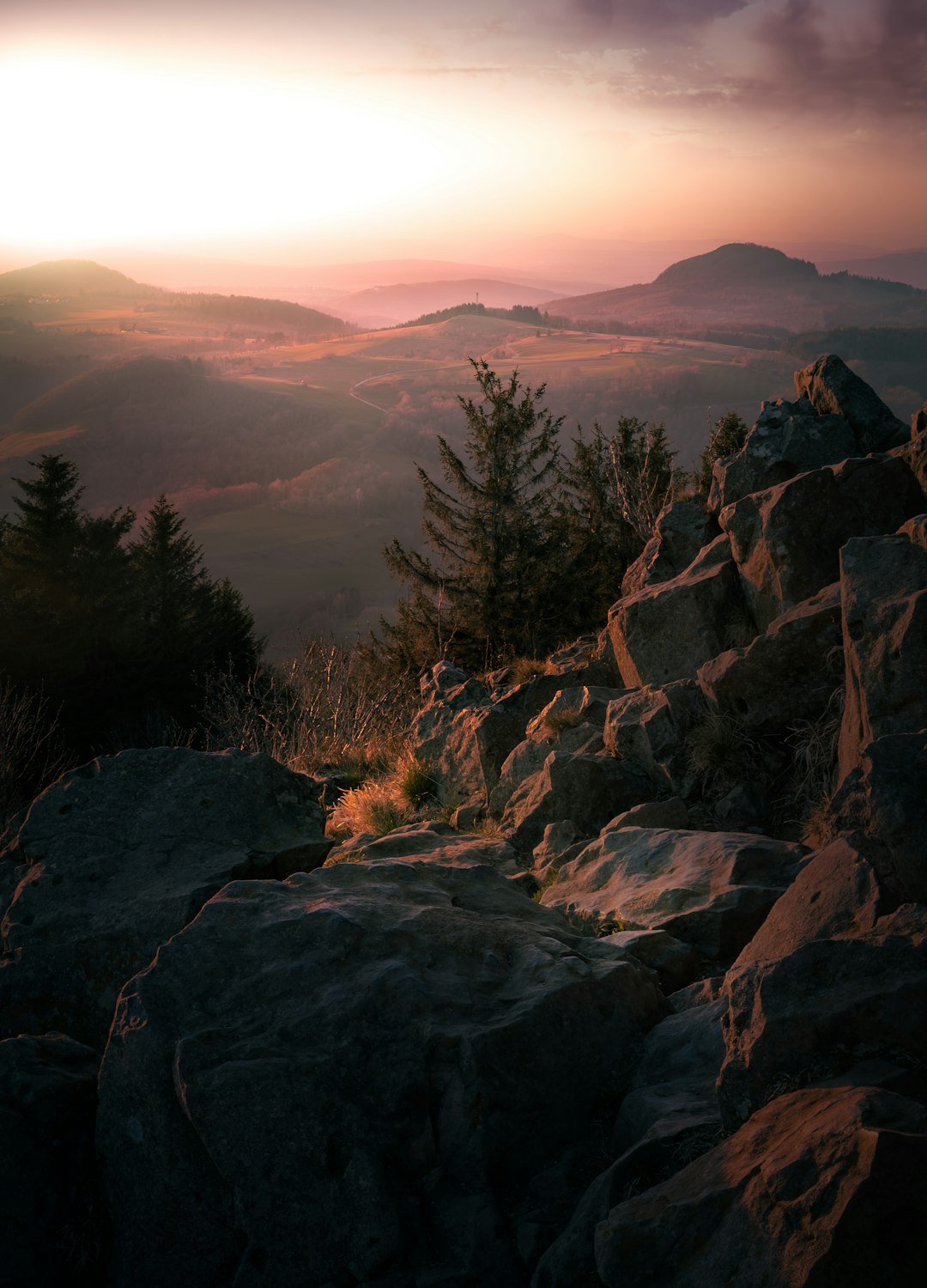 brown and gray rocky mountain during sunset