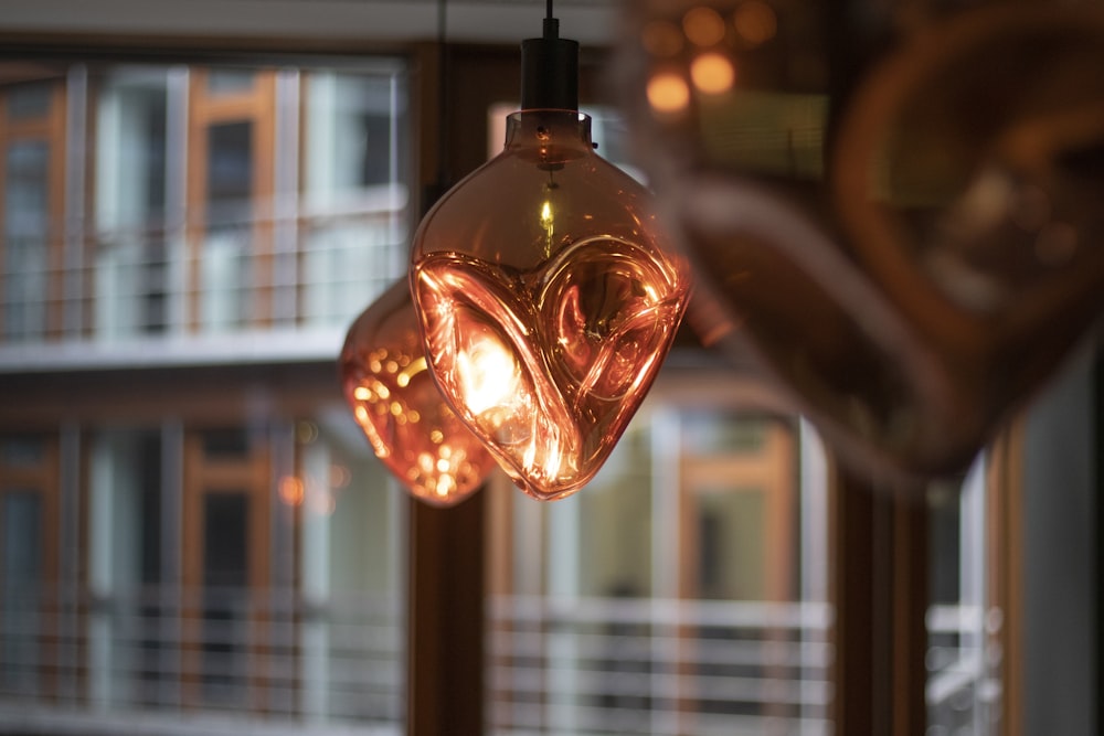 selective focus photography of light bulb