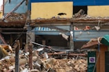 A before-and-after image of a demolished building.