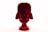 A Lego model resembling the helmet of a dark character with a glossy finish, presented in a striking red hue against a bright white background. The Lego pieces are intricately assembled to capture the iconic shape and features of the helmet, with a base displaying related branding.