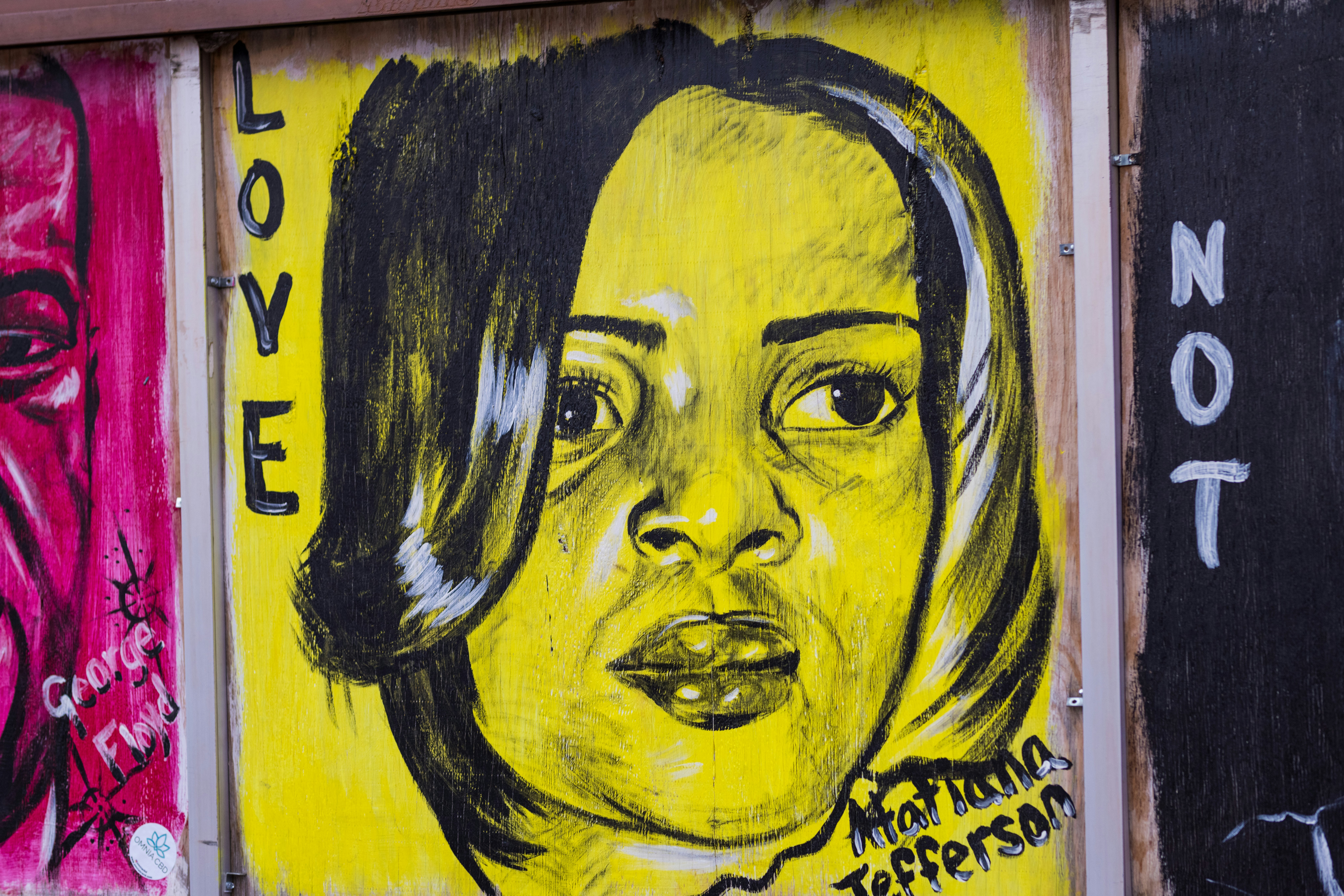 womans face with yellow hair painting