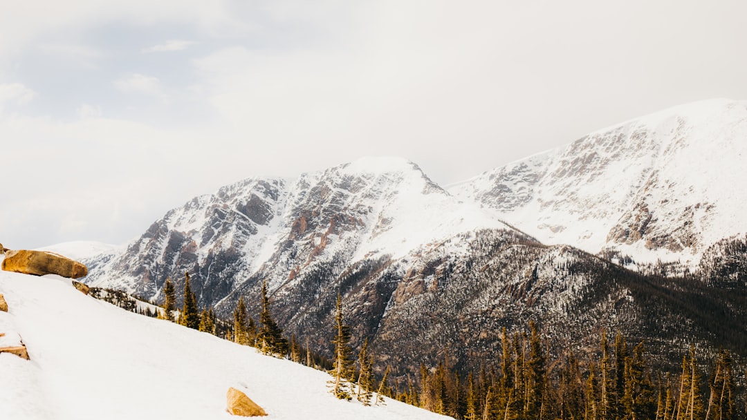 snow covered mountain during daytime