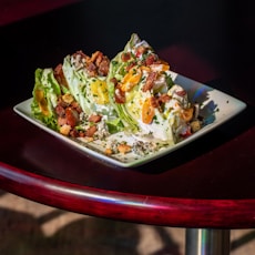 white ceramic square plate with vegetable salad