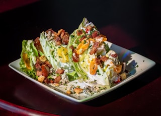 white ceramic square plate with vegetable salad