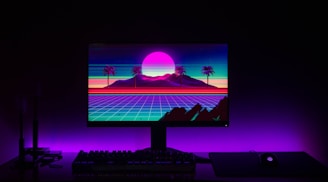 black flat screen computer monitor turned on displaying man in black suit