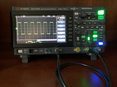 Oscilloscope screen showing waveform patterns from a high-speed interface validation.