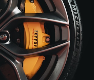 black and yellow 5 spoke car wheel