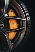 black and yellow 5 spoke car wheel