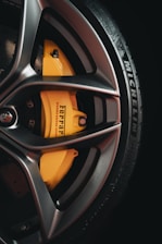 black and yellow 5 spoke car wheel