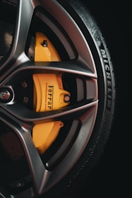 black and yellow 5 spoke car wheel