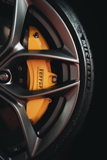 black and yellow 5 spoke car wheel