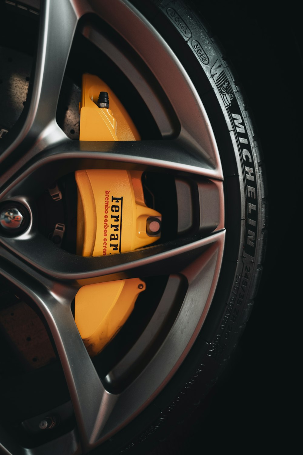 black and yellow 5 spoke car wheel