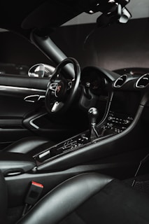 black and silver mercedes benz steering wheel