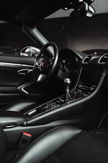 black and silver mercedes benz steering wheel