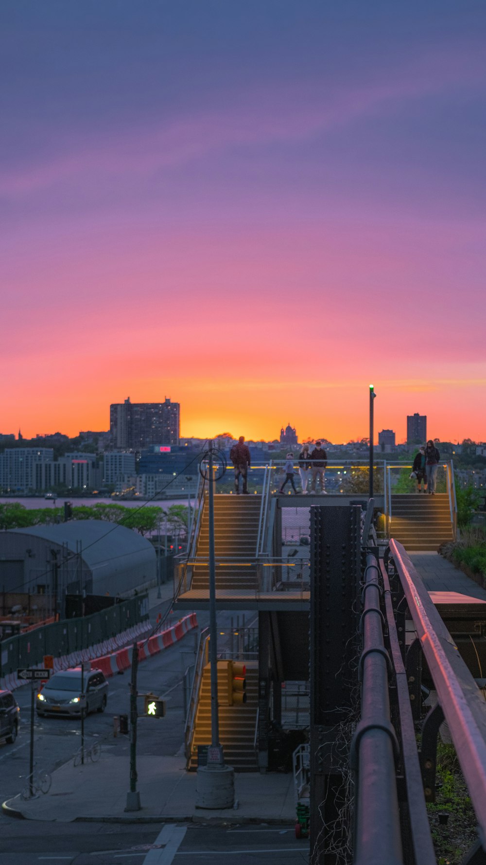 city skyline during sunset with orange sky