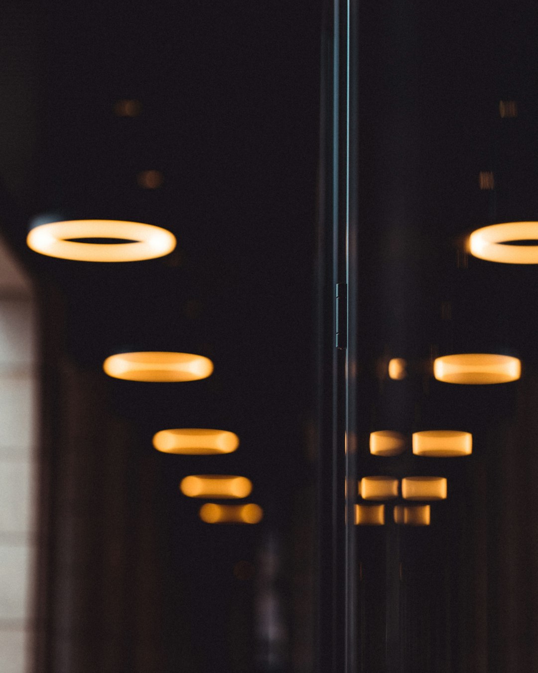 black wooden cabinet with light fixture