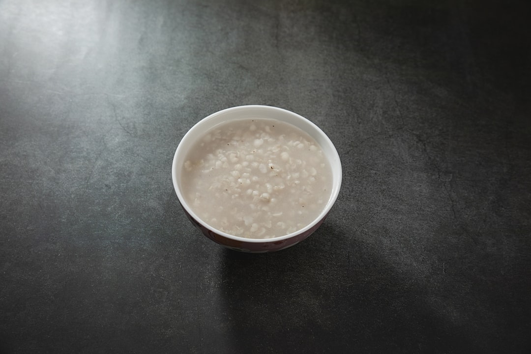 white plastic cup with brown liquid