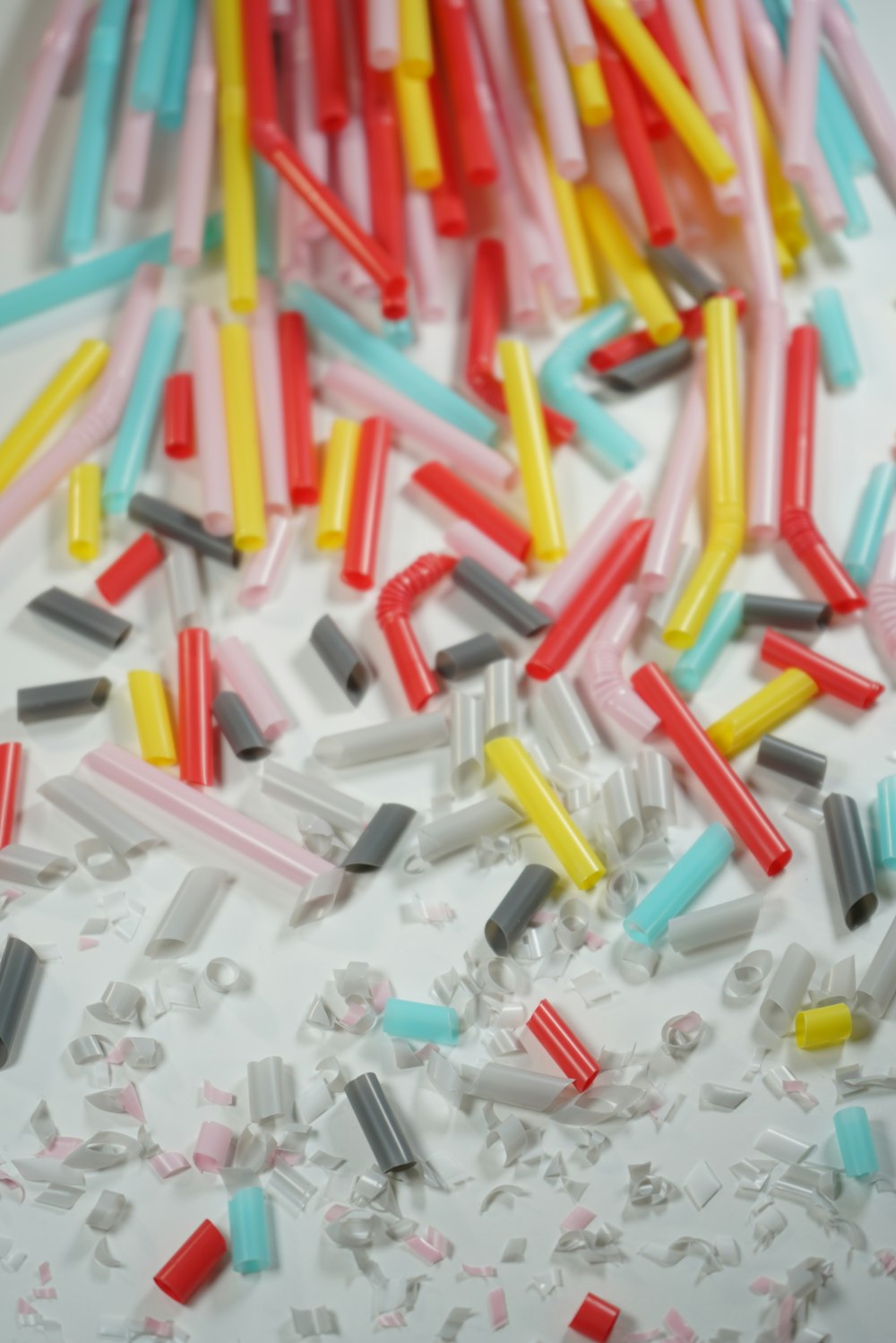 white red yellow and green plastic straw lot