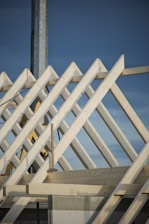 white wooden fence under blue sky during daytime