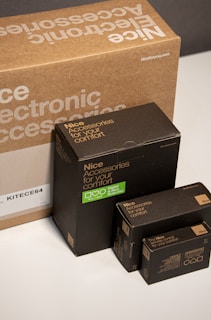 Several cardboard boxes with branding and text indicating they contain accessories for comfort. The boxes vary in size and have a consistent design theme with 'Nice' branding.