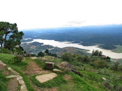 Local guide warmly welcoming guests at a scenic viewpoint in the Lakes region.