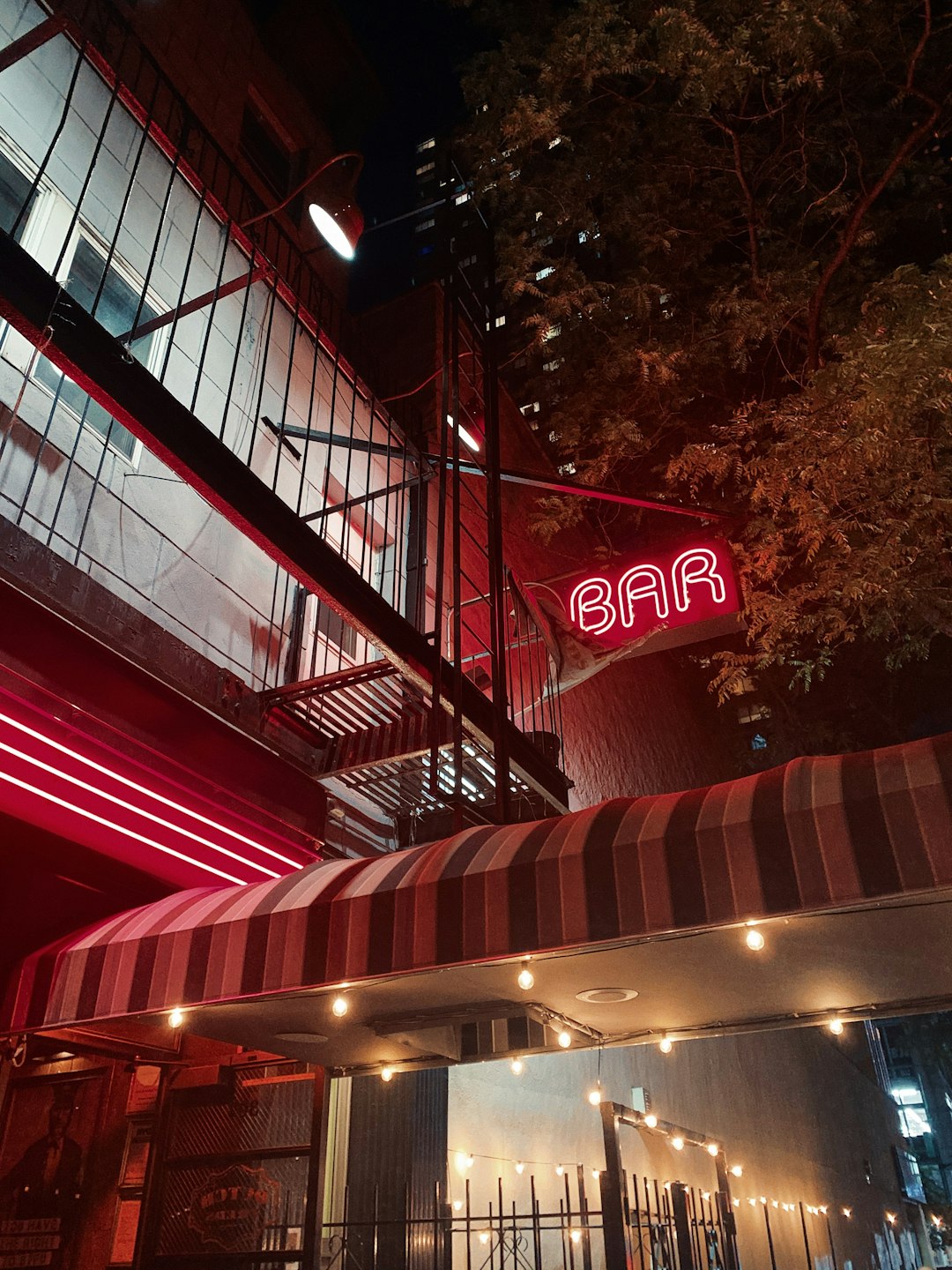 red and white lighted building during nighttime