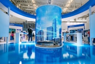 people standing in front of blue and white building