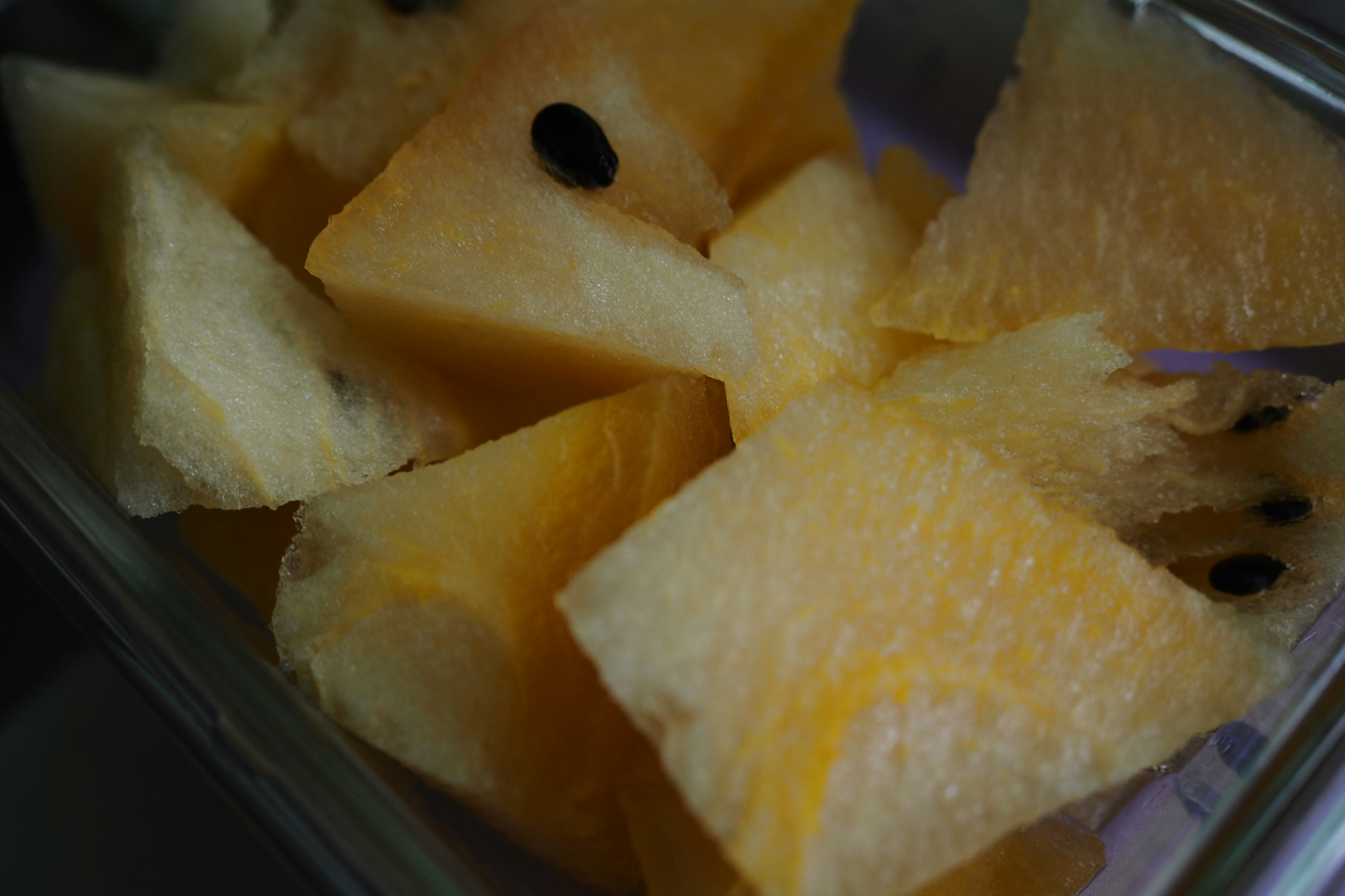 sliced fruit on glass plate