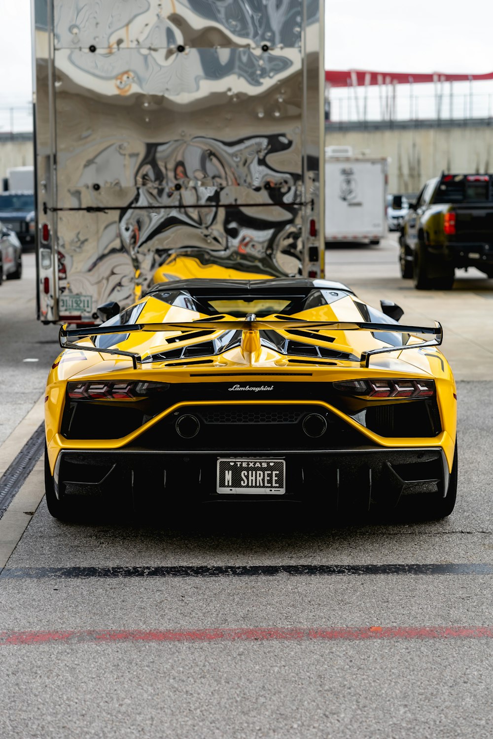 yellow and black lamborghini aventador