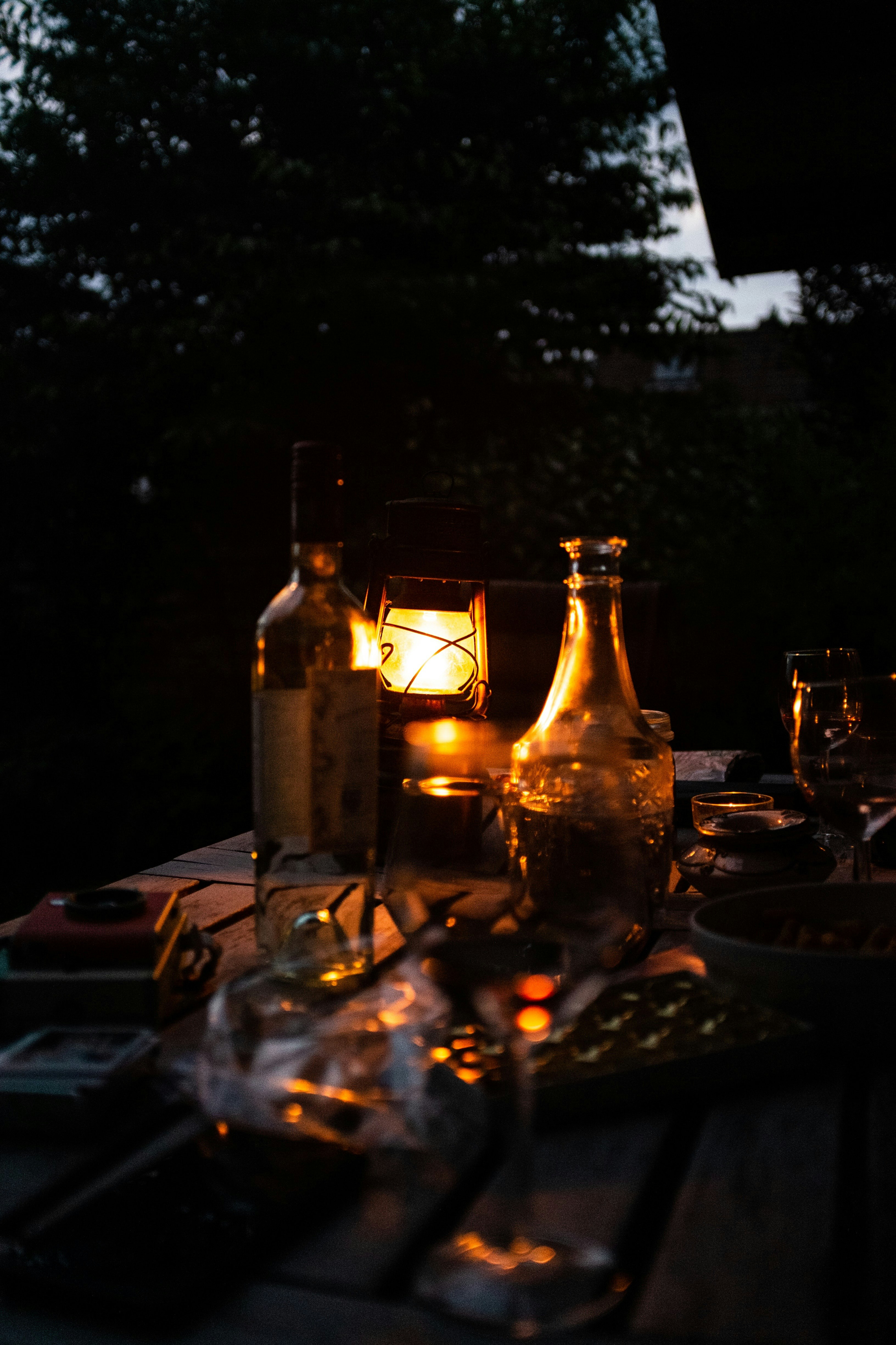 clear glass bottles on table